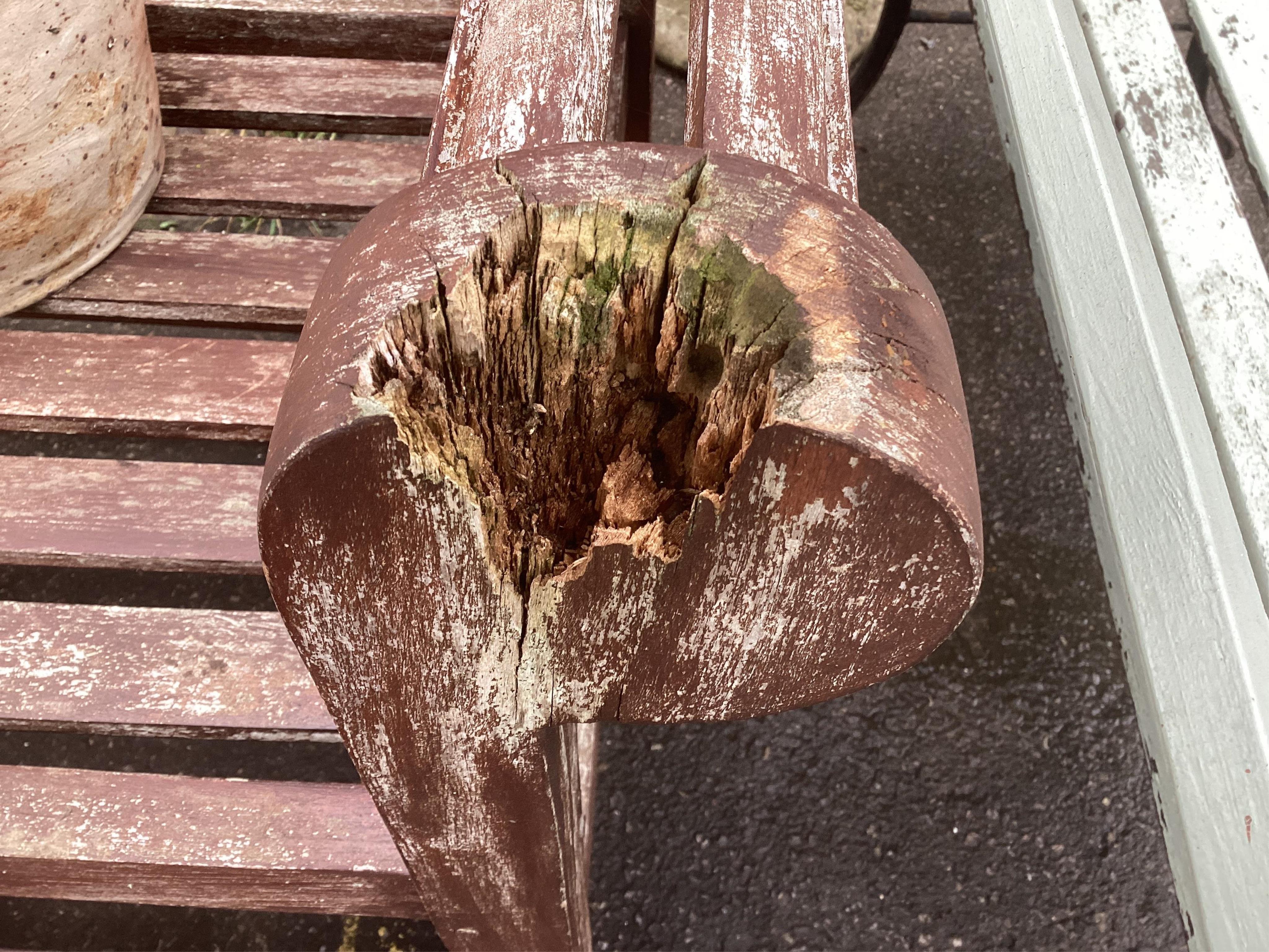 A pair of Lutyens style stained teak garden benches, width 166cm, depth 58cm, height 103cm